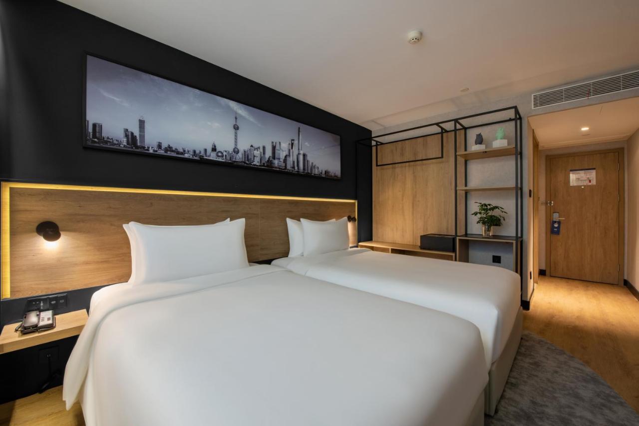 Park Inn By Radisson Shanghai Huanqiugang Exterior foto